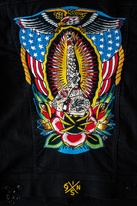 Black denim Lee Riders jacket hand embroidered.
